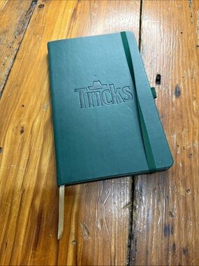 Castelli Made in Italy Green Leatherette Journal with Tricks on it
